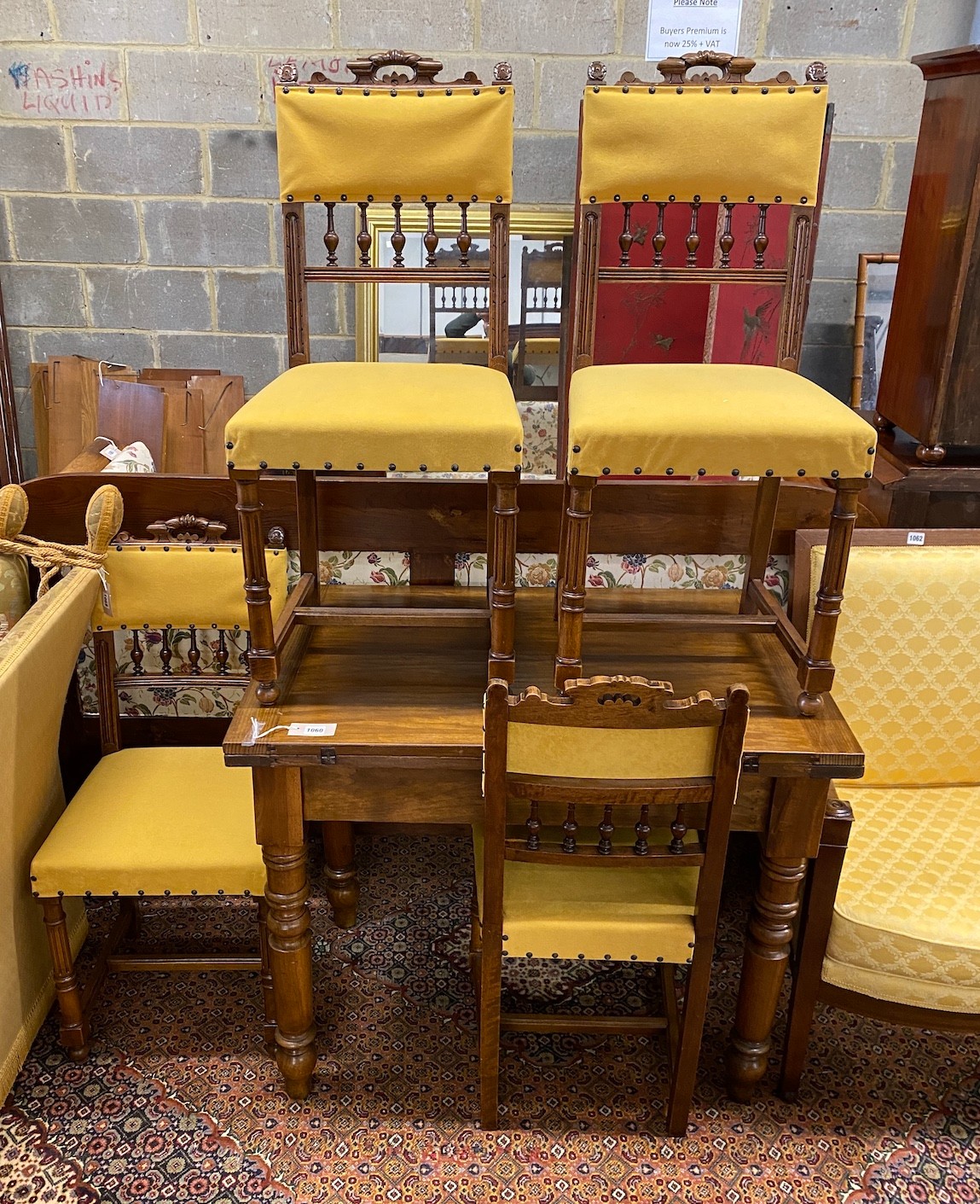 A late 19th century French rectangular walnut folding dining table, length 96cm, width 63cm, height 79cm and four 19th century French dining chairs